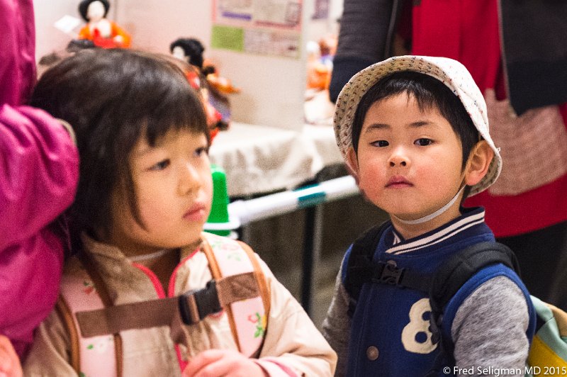 20150312_103953 D4S.jpg - Children visiting museum area at Nagoya Castle.  Well-mannered and quite interested in what they see.